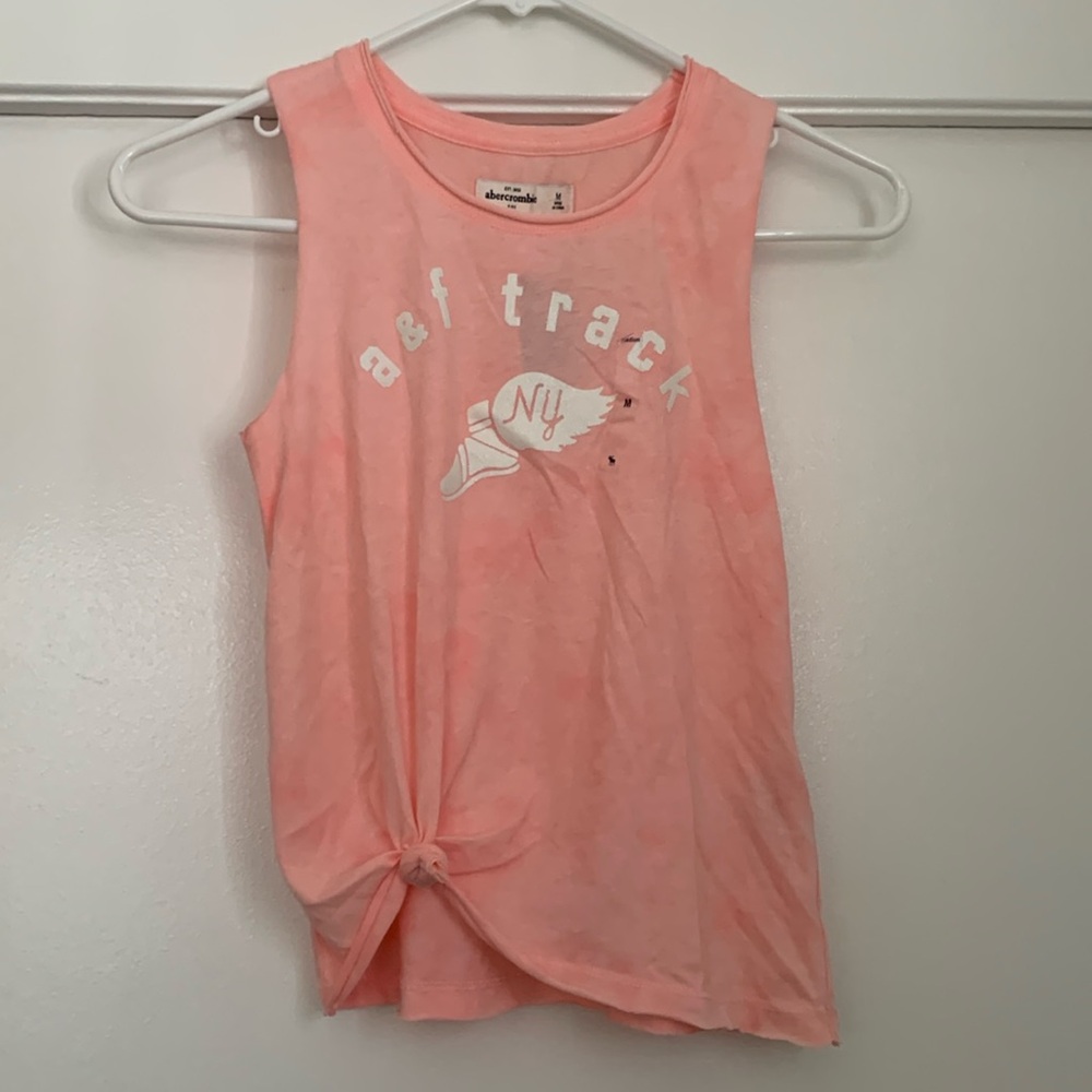 Cute tank with graphic in the front.